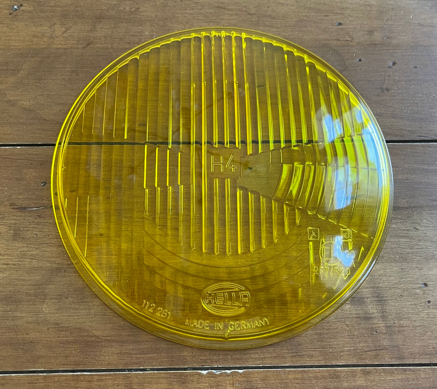 Hella yellow headlamp glass lense.