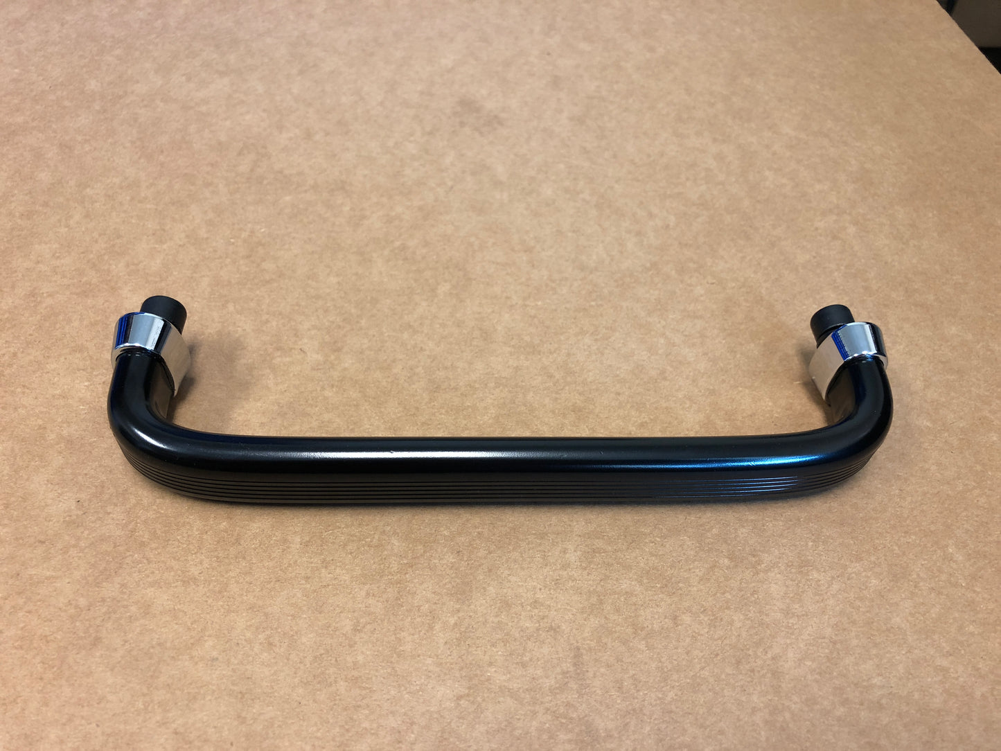 Dash grab handle aluminum in black color.