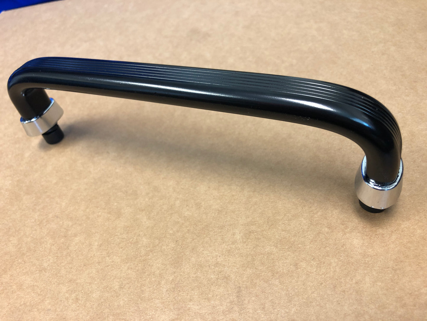 Dash grab handle aluminum in black color.